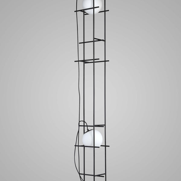 POLES APART- A PEDESTAL LAMP