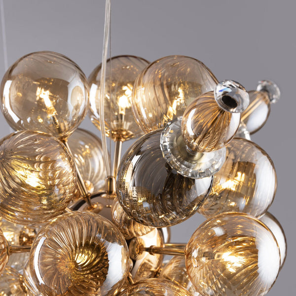 THE SPHERICAL ILLUMINATION CHANDELIER